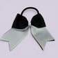 Black and white bow bobble on card
