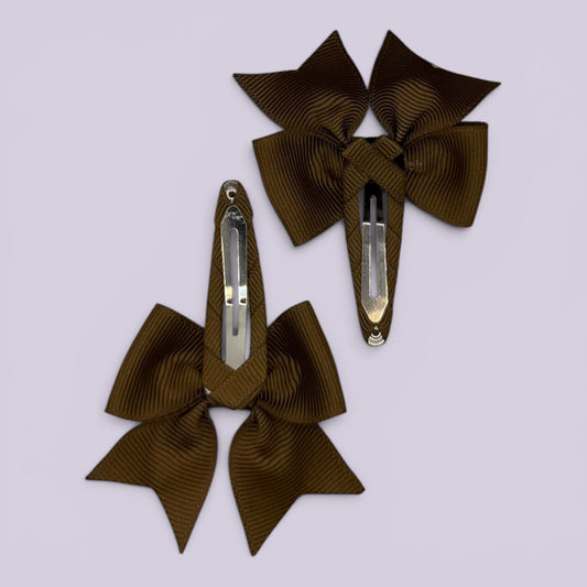Brown butterfly snap clips on card