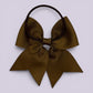 Brown four tailed bow bobble on card