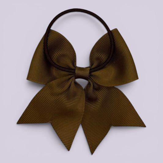Brown four tailed bow bobble on card