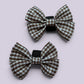 Brown gingham shoe bows close up