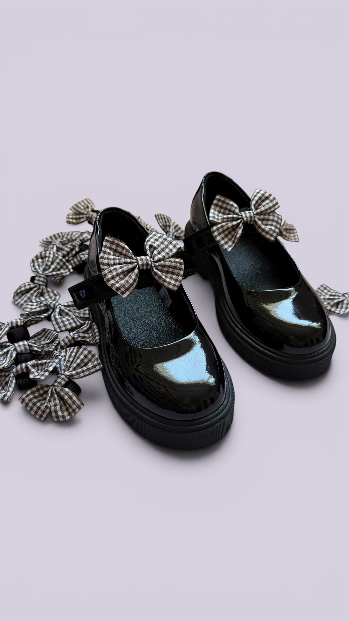 Brown gingham shoe bows on school shoes