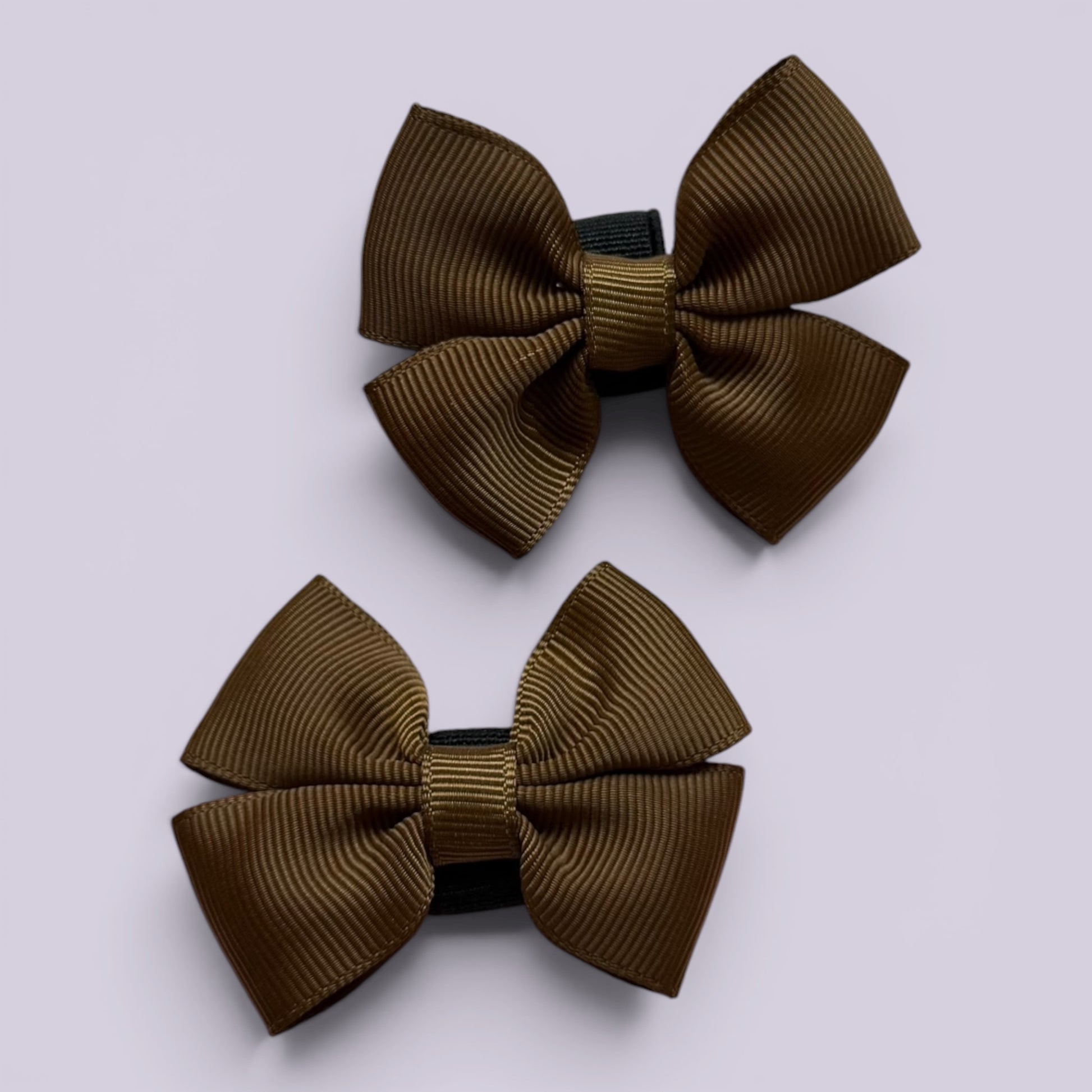 Brown shoe bows close up