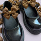 Brown school uniform shoe bows