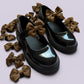 Brown shoe bows on school shoes