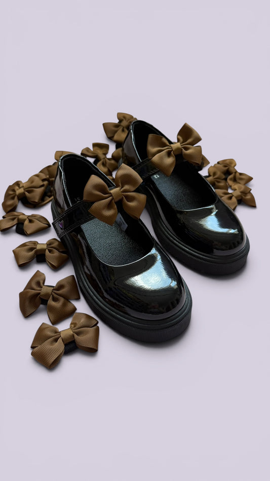 Brown shoe bows on school shoes