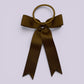 Brown tailed bow bobble on card