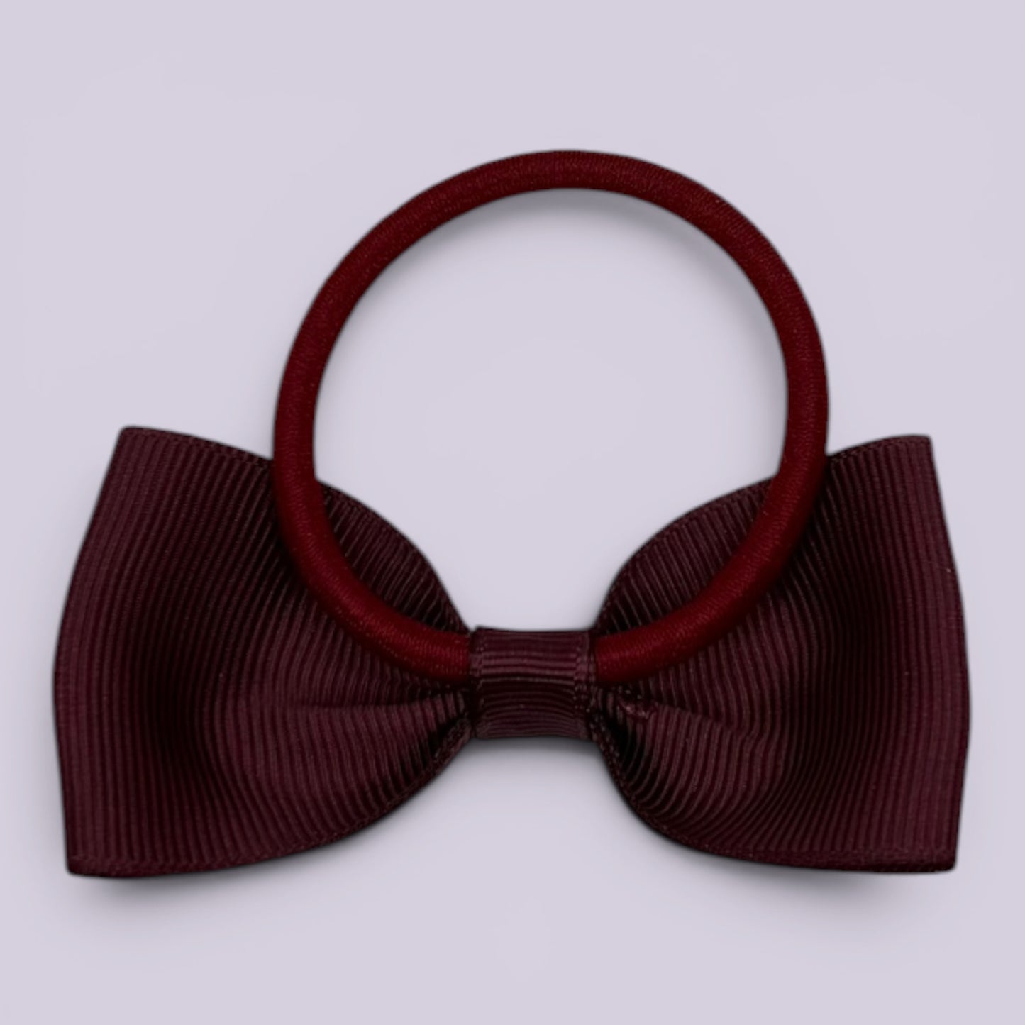 Burgundy maroon bowtie bow bobble on card