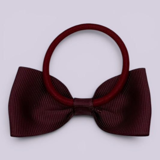 Burgundy maroon bowtie bow bobble on card