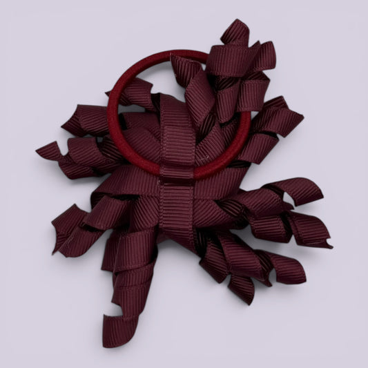 Burgundy maroon korker bow bobble on card