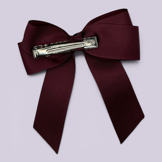 Burgundy maroon tailed bow clip on card