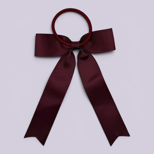 Burgundy maroon tailed bow bobble on card