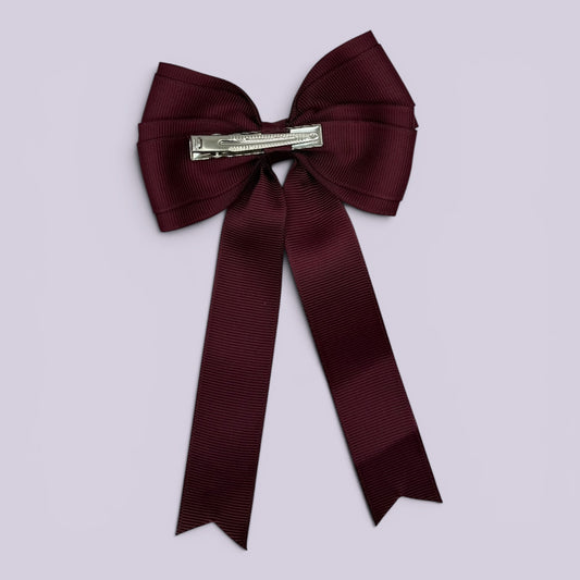 Burgundy maroon tailed bow clip on card