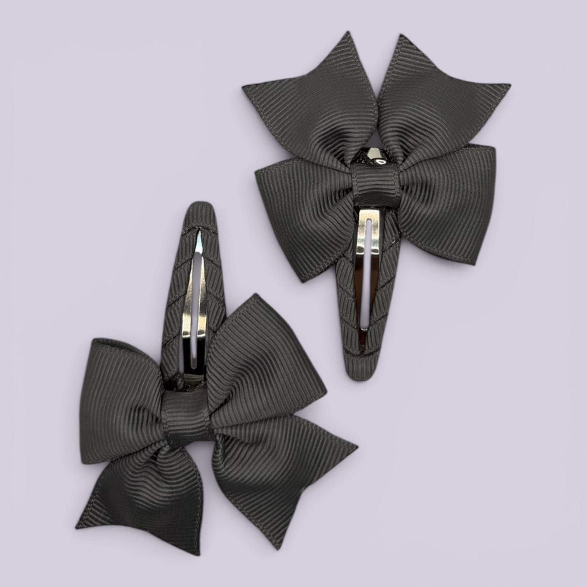 Grey butterfly school snap hair clips