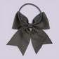 Grey four tailed bow bobble on card