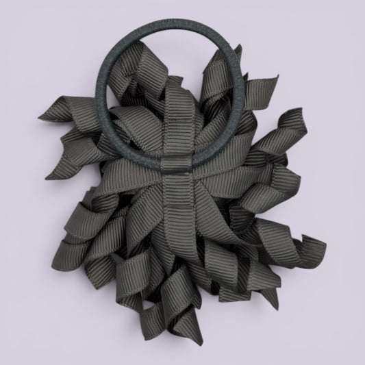 Grey korker bow bobble on card