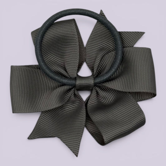 Grey pinwheel bow bobble on card