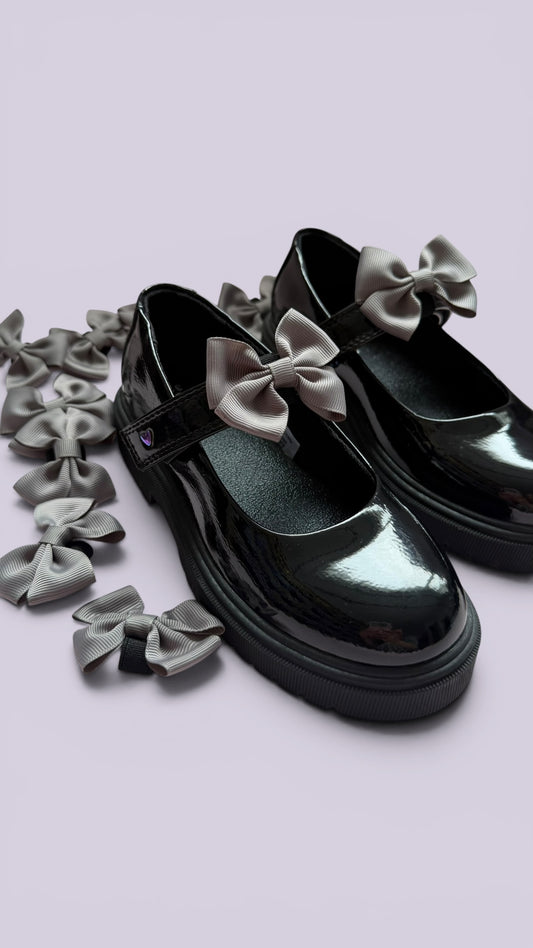 Grey shoe bows on school shoes