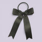 Grey tailed bow bobble on card
