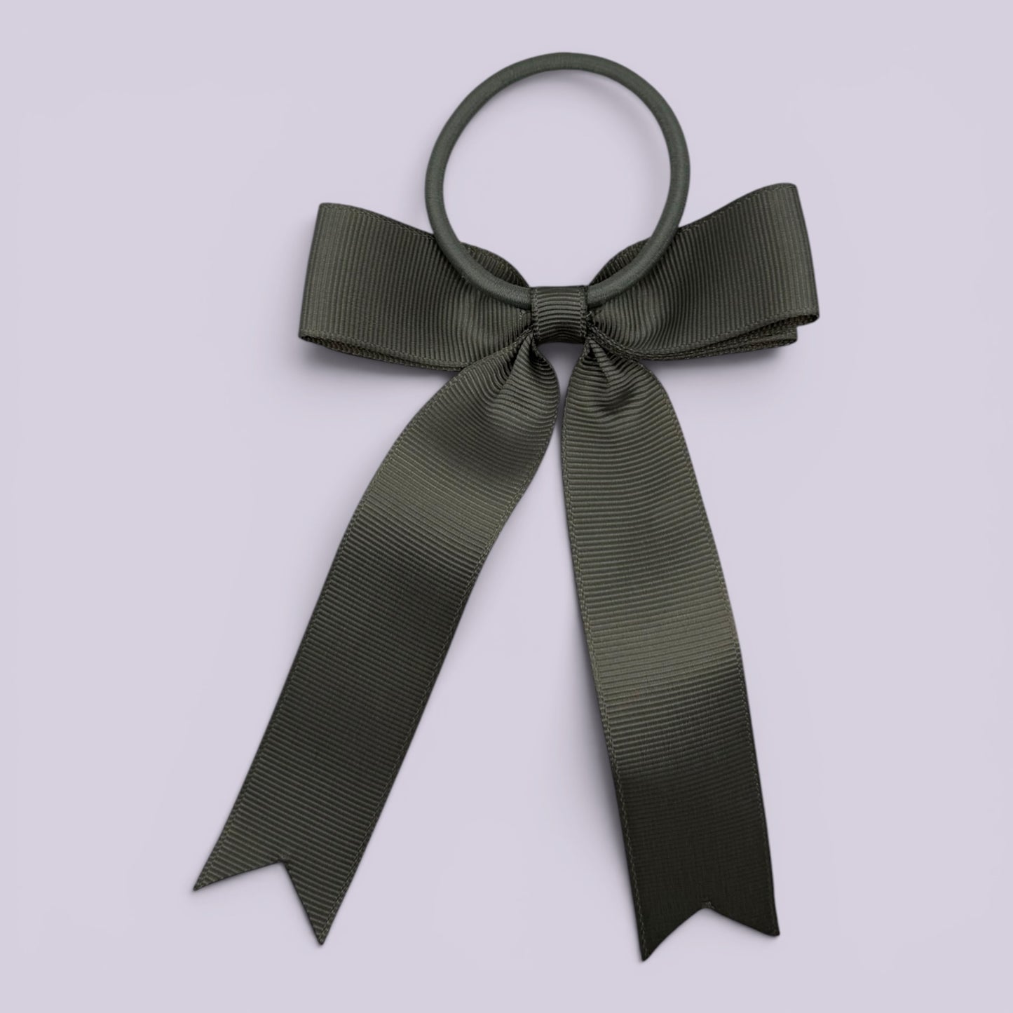 Grey tailed bow bobble on card