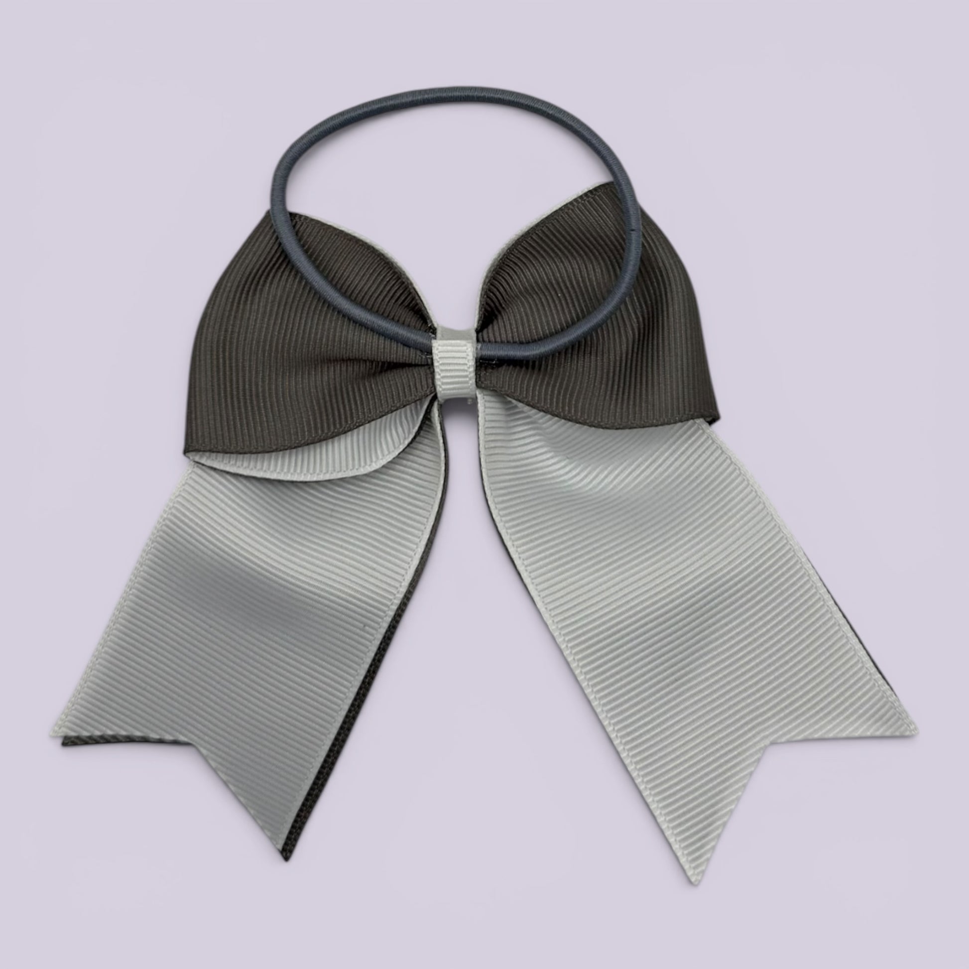 Grey and white bow bobble on card
