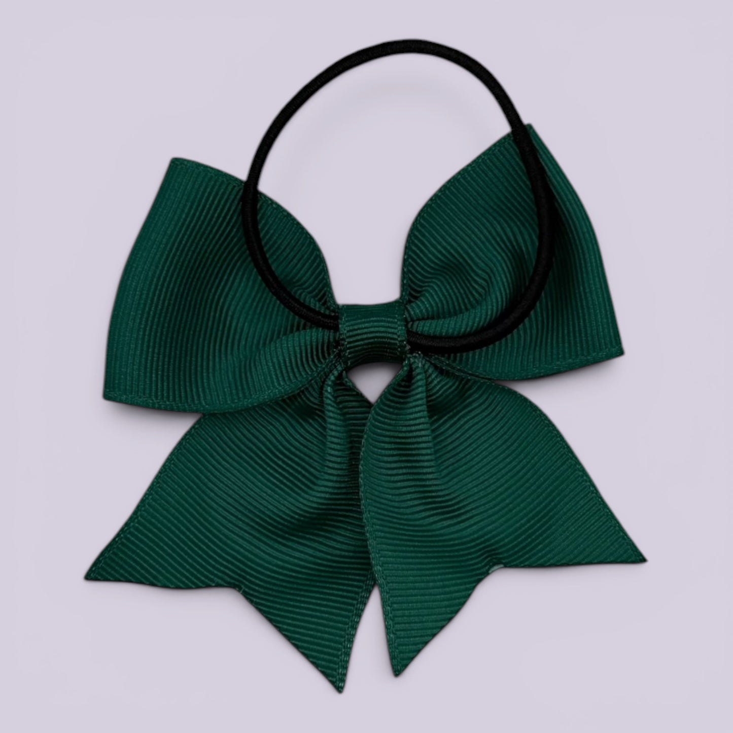 Hunter bottle green four tailed bow bobble on card