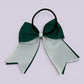 Hunter bottle green and white bow bobble on card