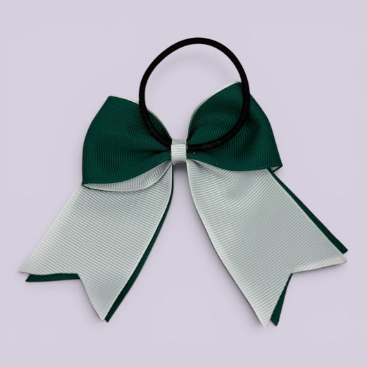 Hunter bottle green and white bow bobble on card
