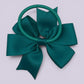 Jade green pinwheel bow bobble on card