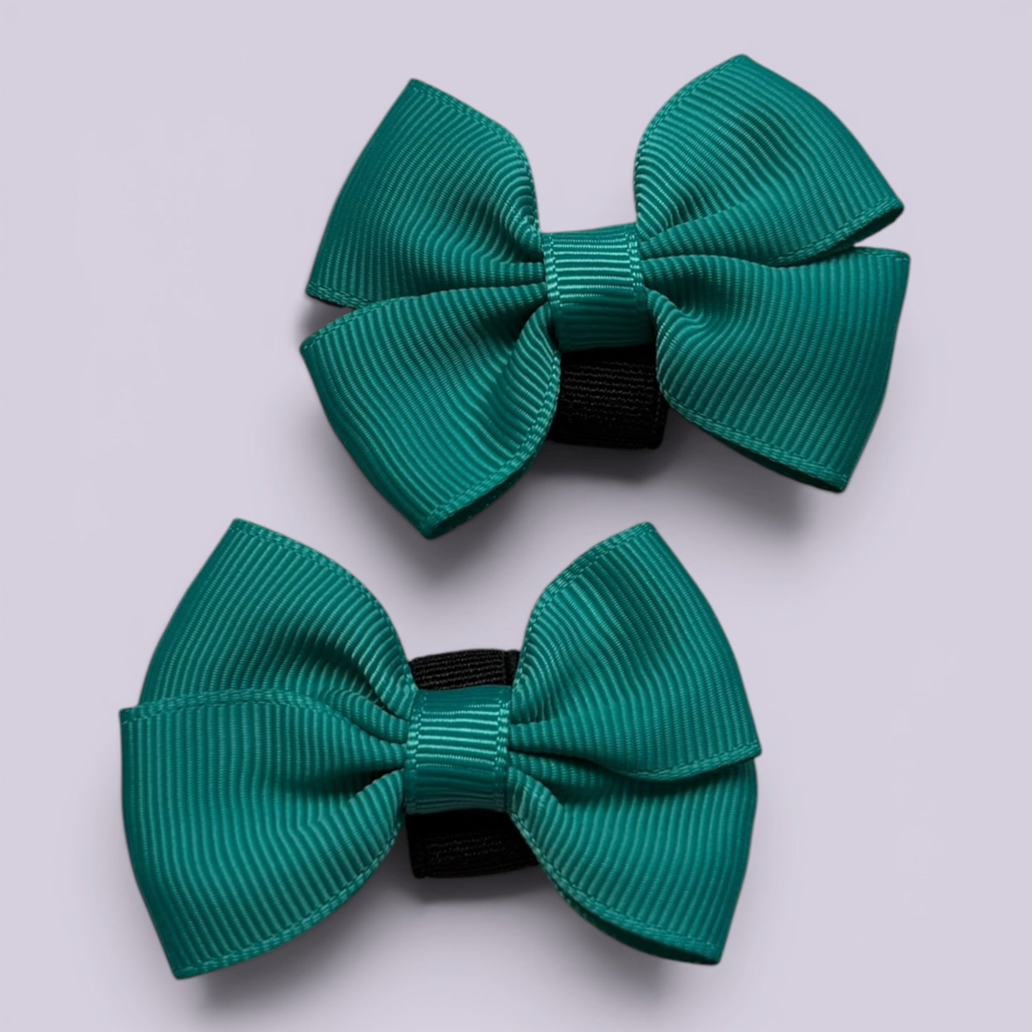 Jade green shoe bows close up