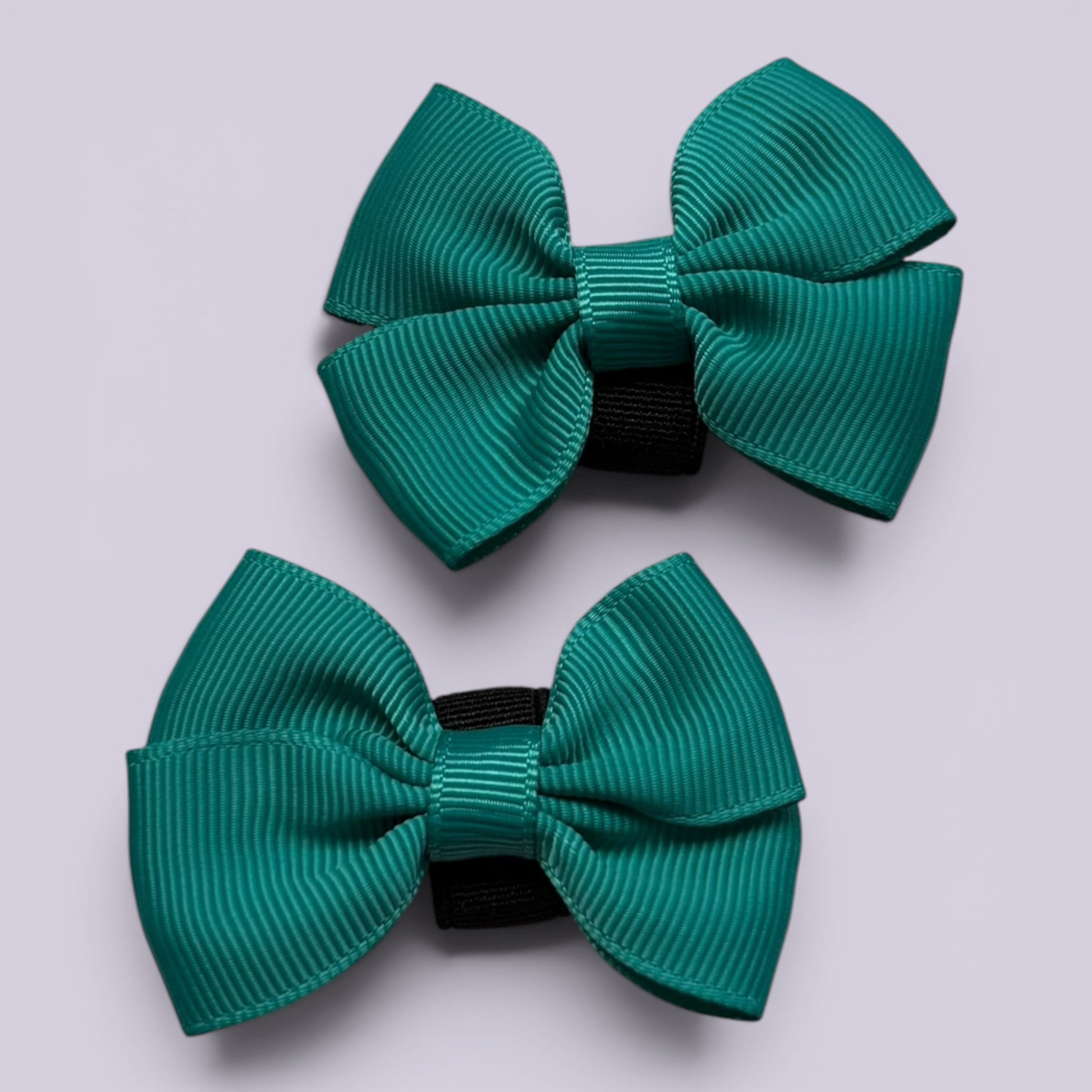Jade green shoe bows close up