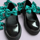 Jade green shoe bows on school shoes