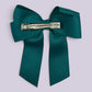 Jade green tailed bow clip on card