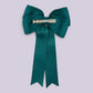 Jade green tailed bow clip on card
