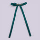 Jade green tailed bow clip