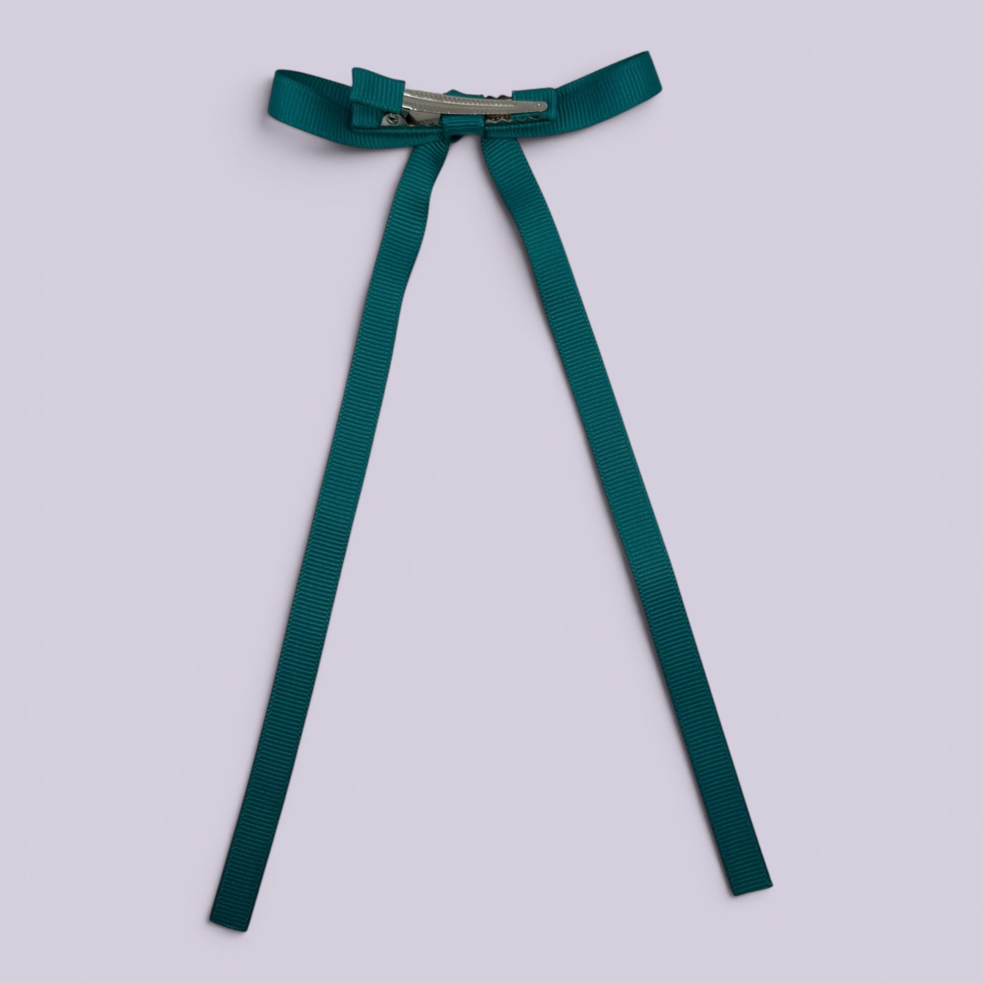 Jade green tailed bow clip