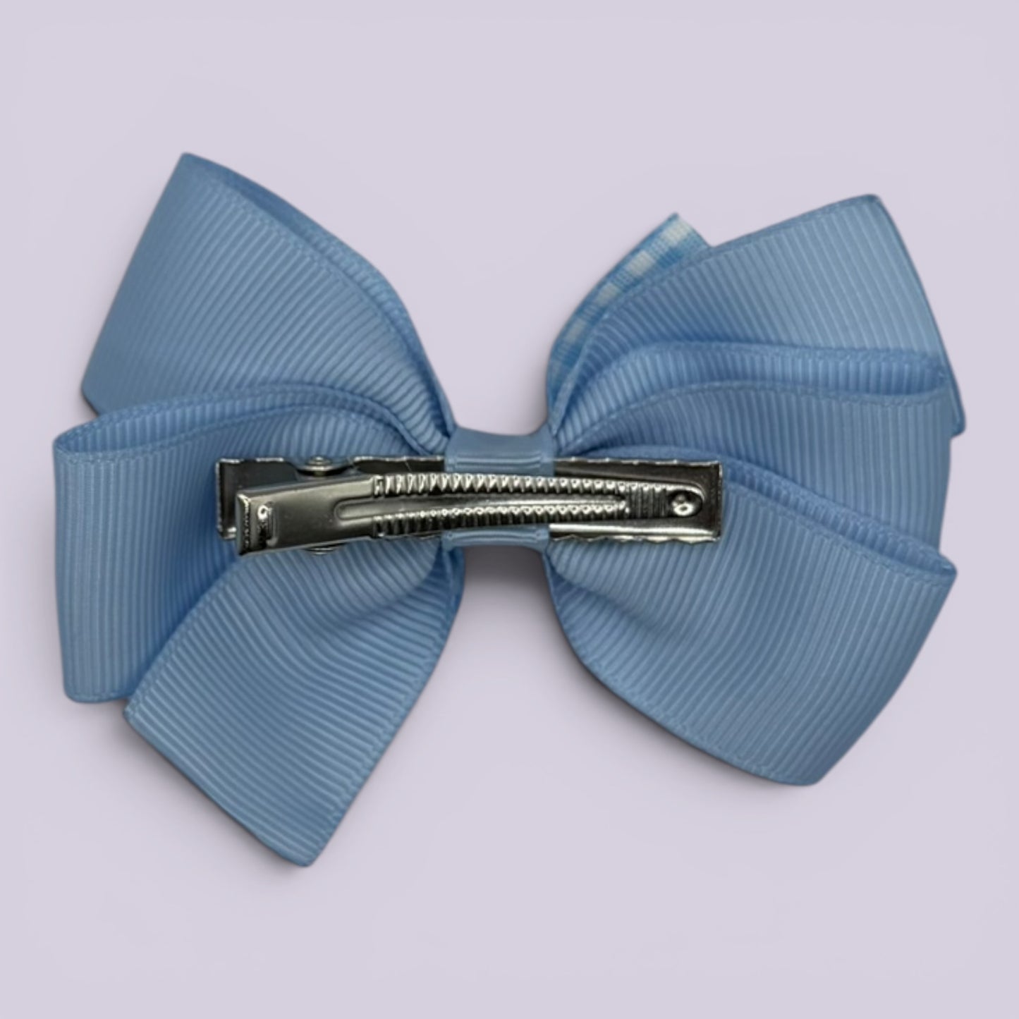 Light blue gingham pinwheel bow clip on matching card