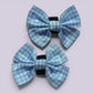 Light blue gingham shoe bows close up