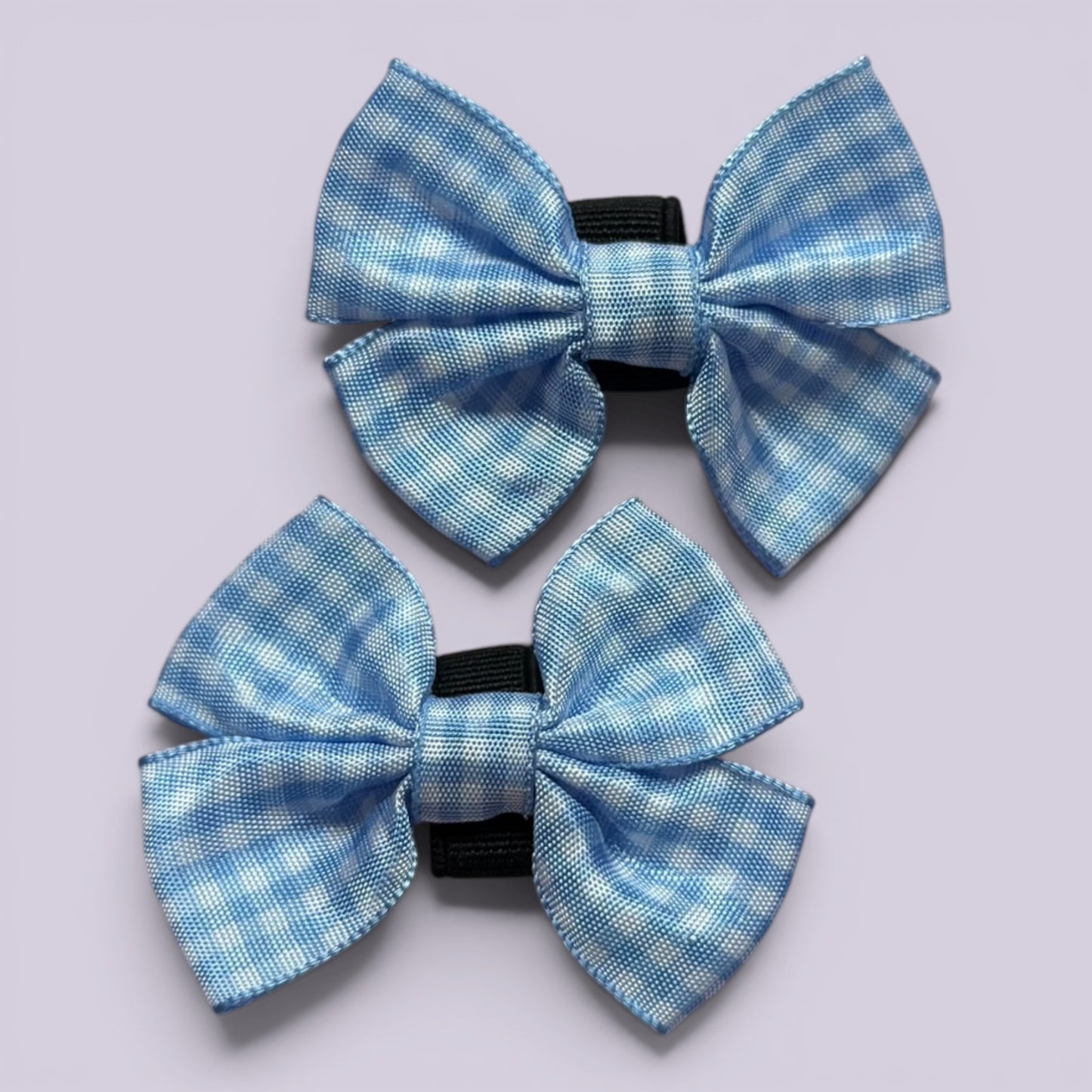 Light blue gingham shoe bows close up