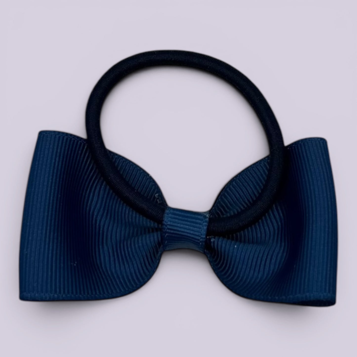 Navy blue bowtie bow bobble on card