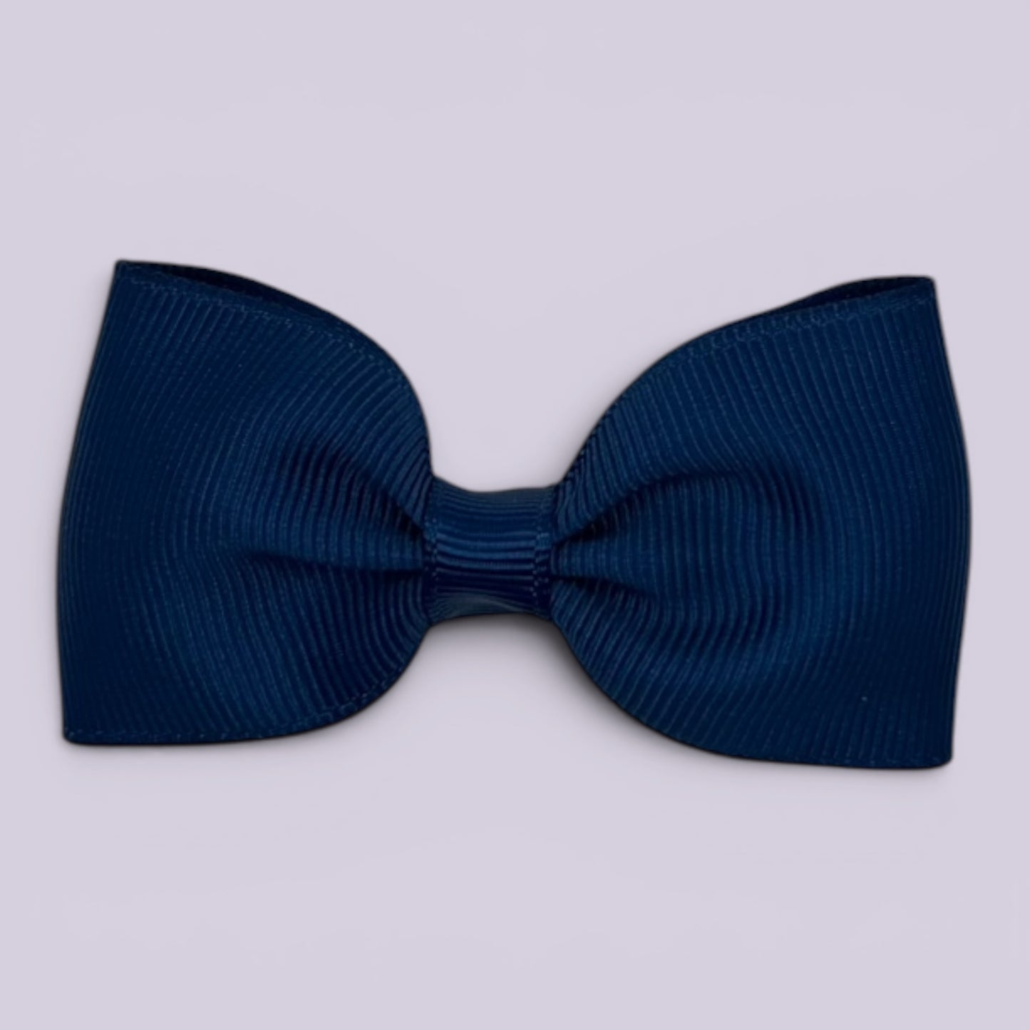 Navy blue bowtie school hair bow clip
