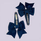 Navy blue butterfly snap clips on card