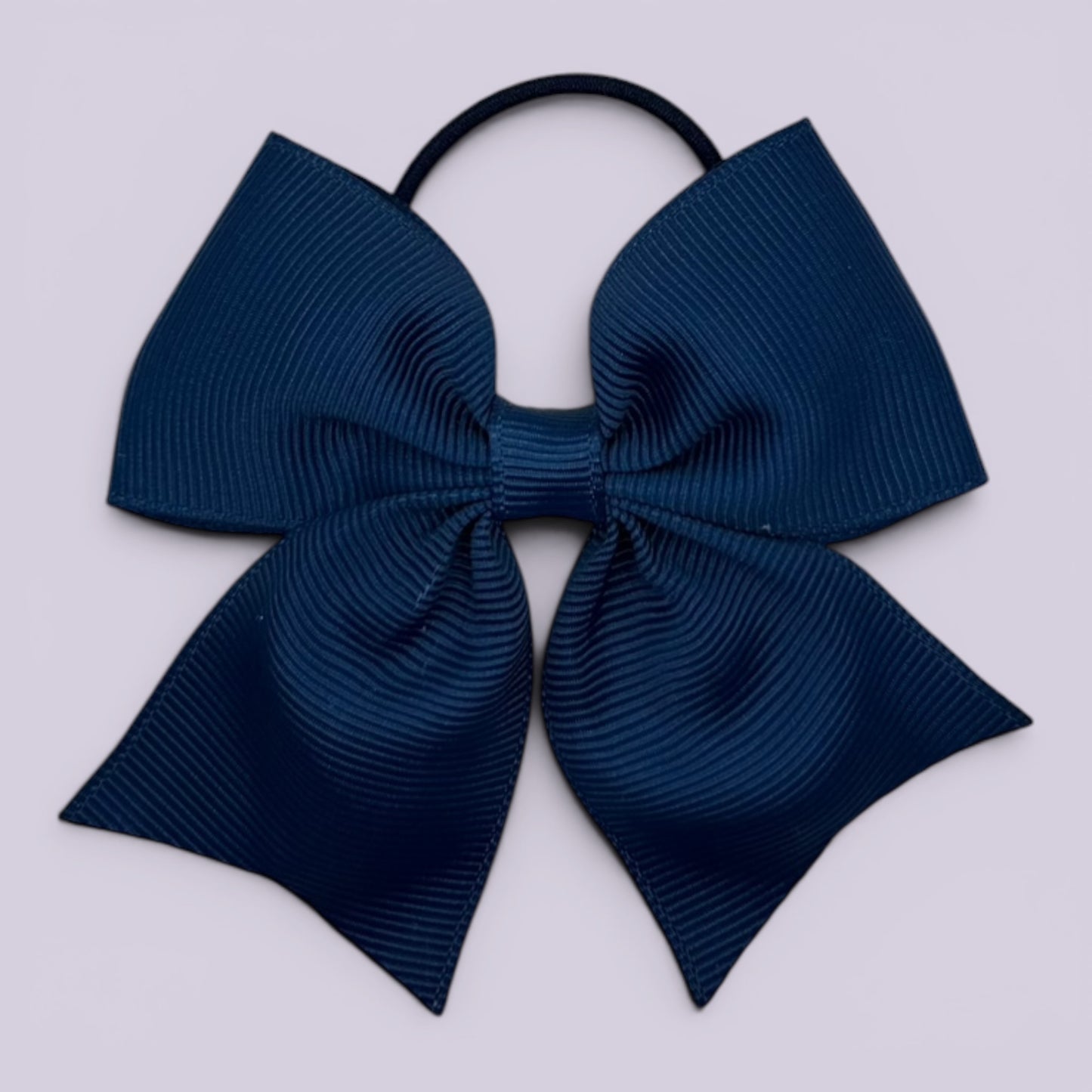 Navy blue four tailed school hair bow bobble