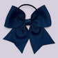 Navy blue four tailed bow bobble on card