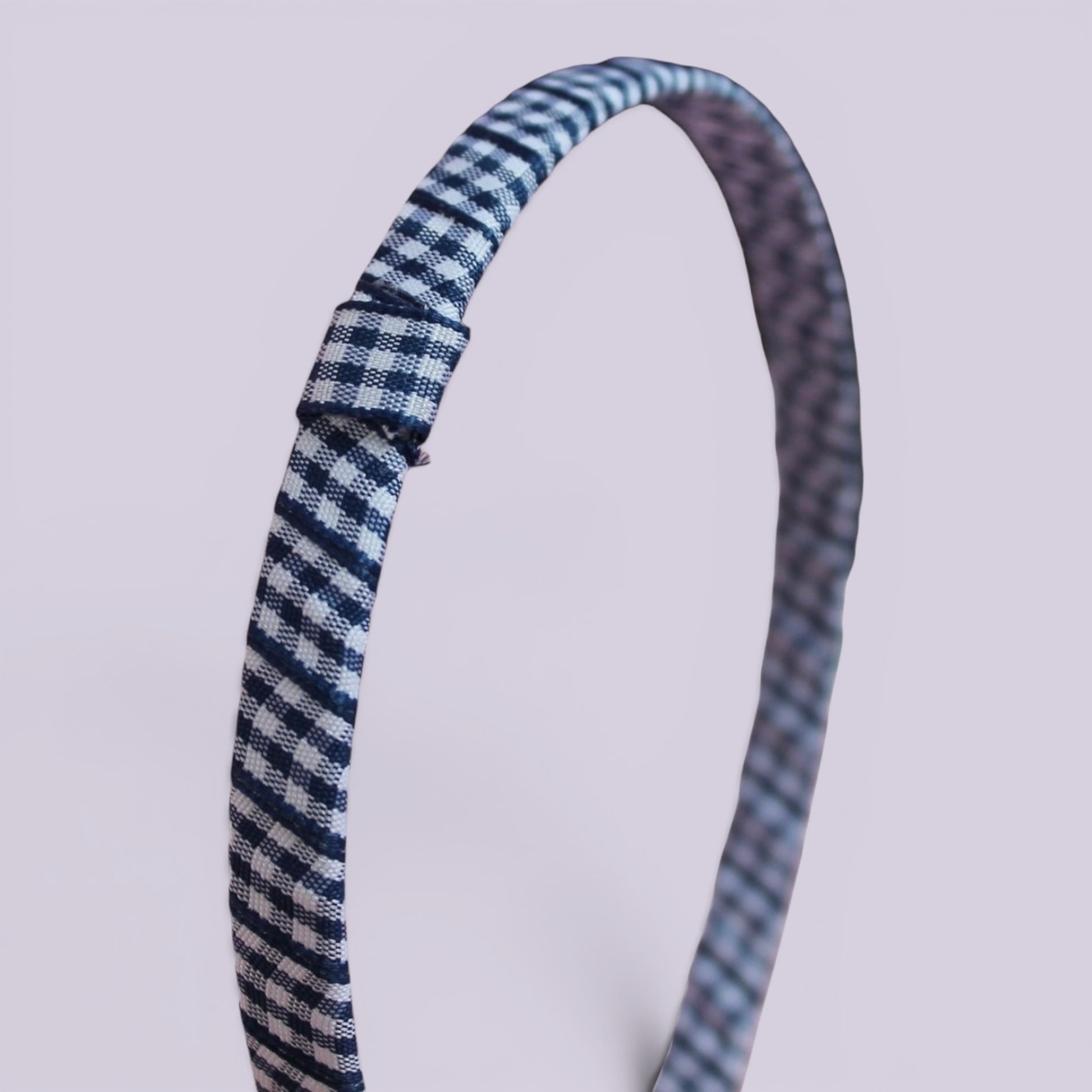 Navy blue gingham headband close up