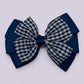 Navy blue gingham pinwheel school hair bow clip