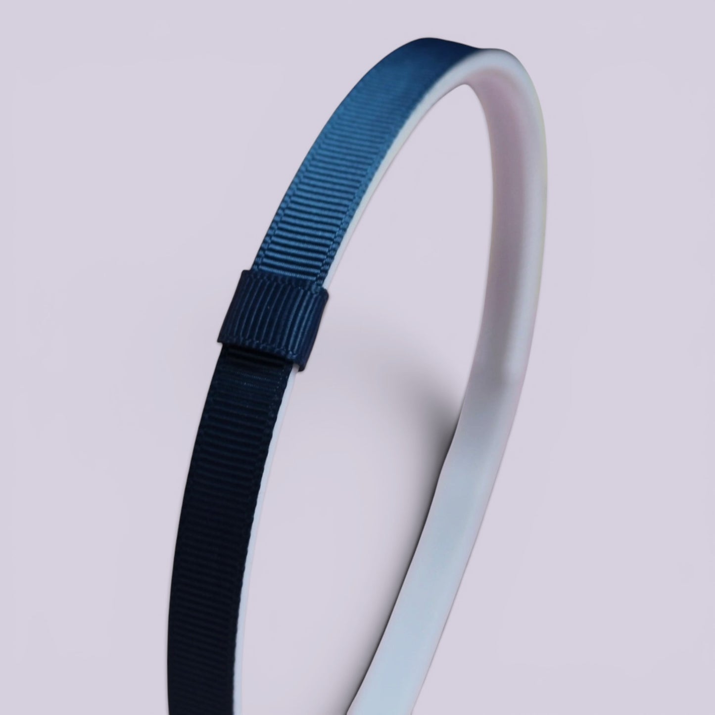 Navy blue headband side view