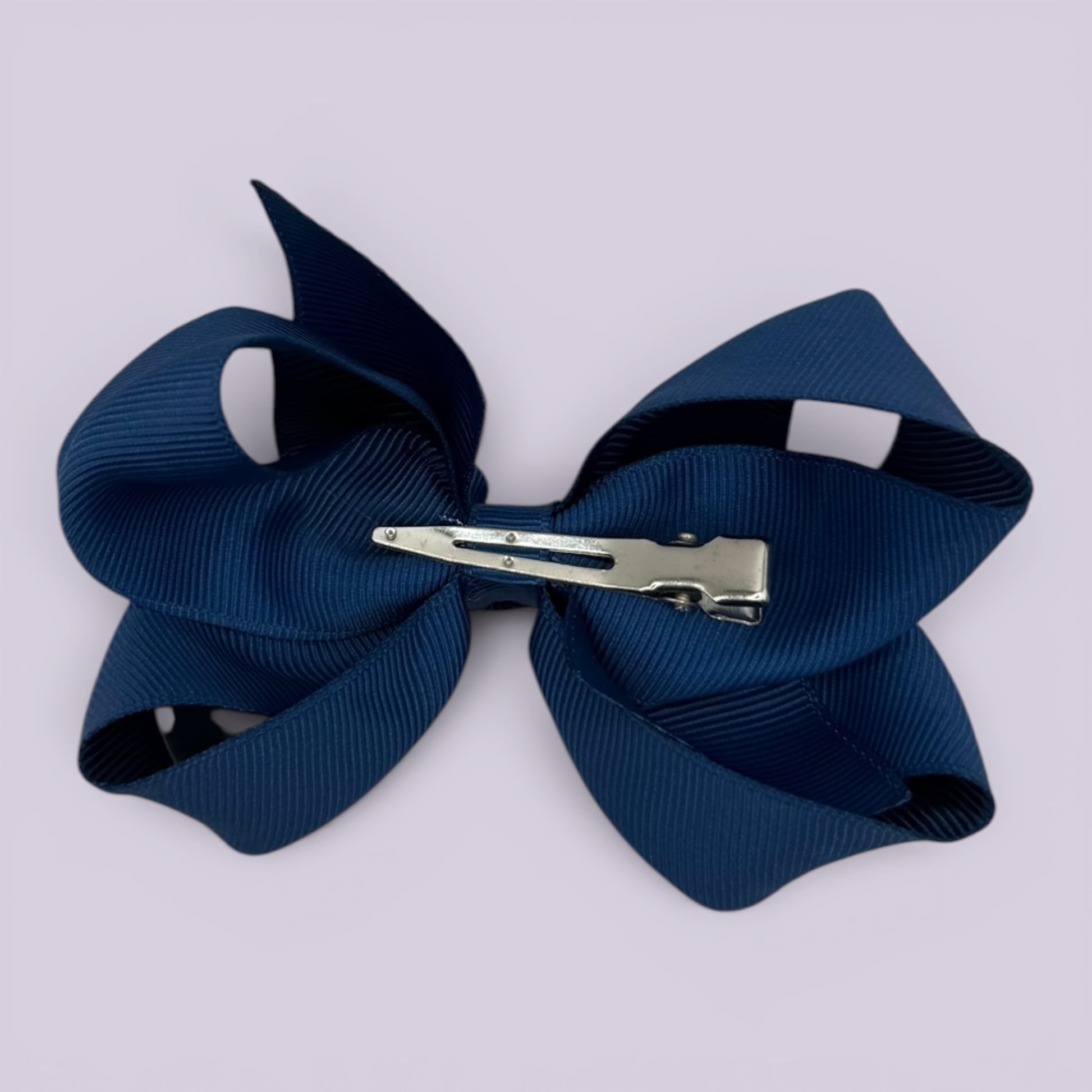 Navy blue large bow clip on card