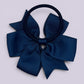 Navy blue pinwheel bow bobble on card