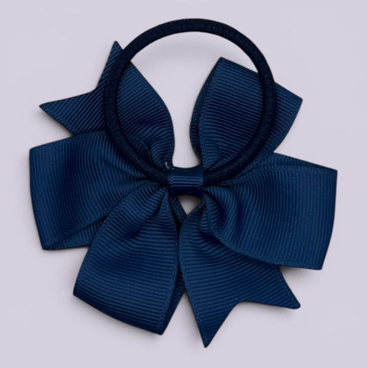 Navy blue pinwheel bow bobble on card